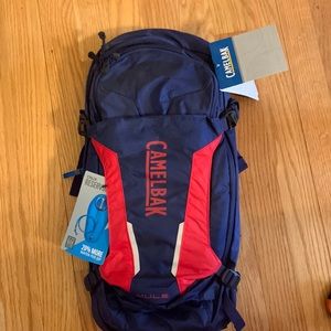 Brand New. Never used. Camelbak 3L 100oz Mule backpack - Blue and Red Mesh back